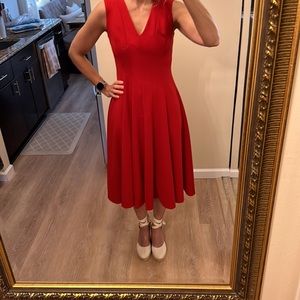EUC Calvin Klein red v neck fit and flare dress w/ gold exposed zipper, size 4